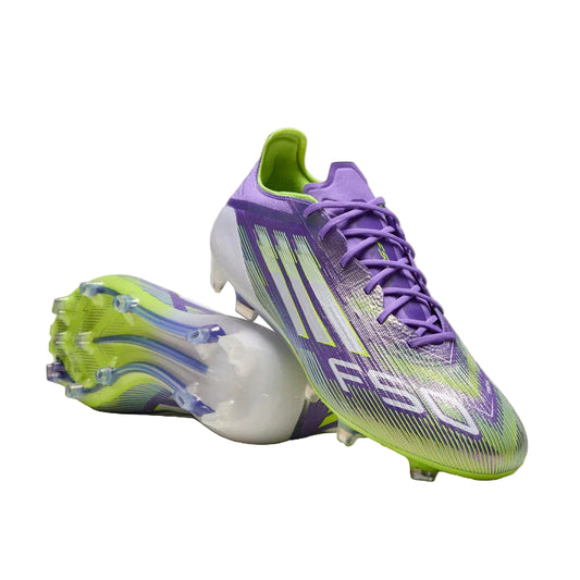 Purple and green soccer cleats on a light gray background